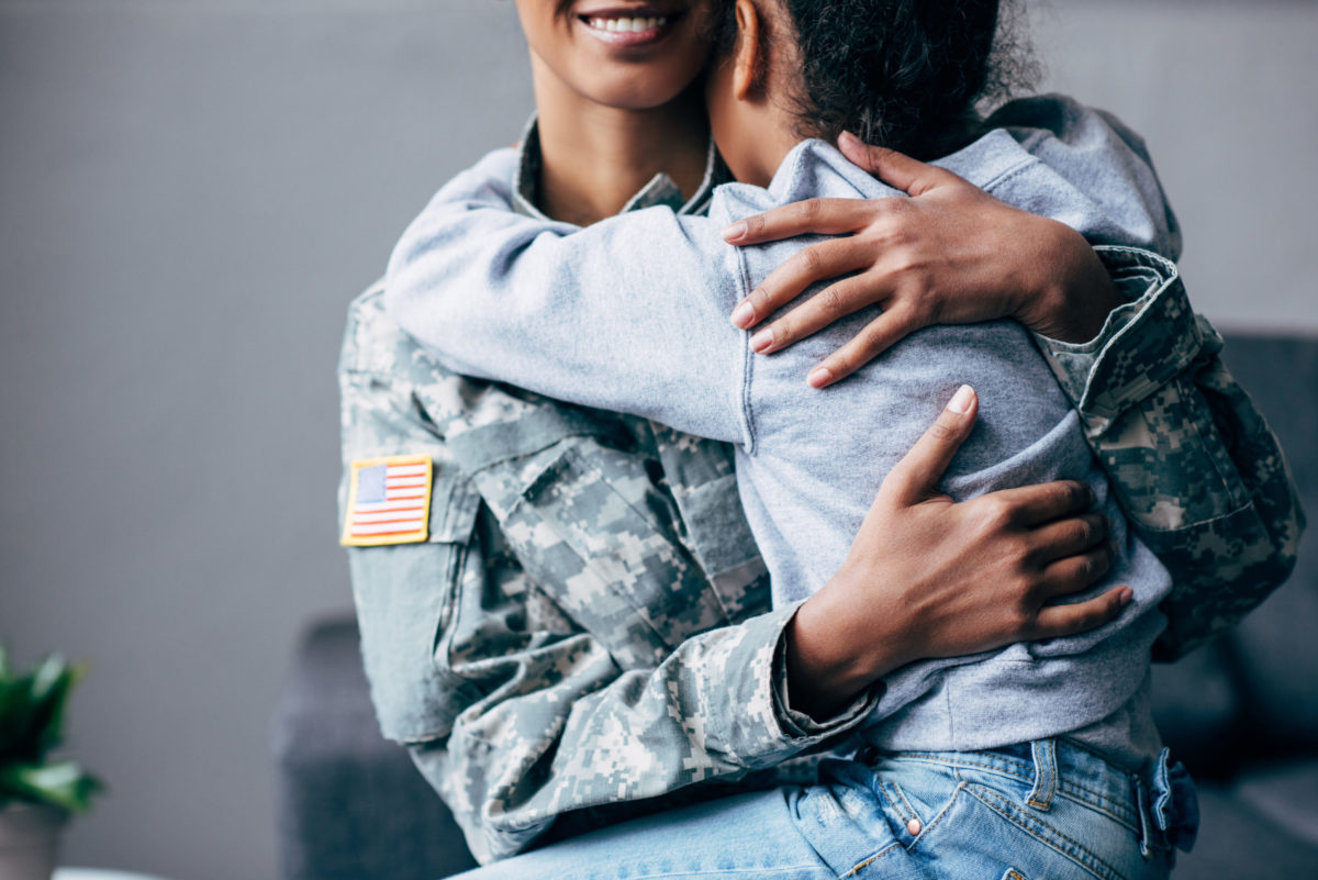 military member and her daughter at a healthcare facility